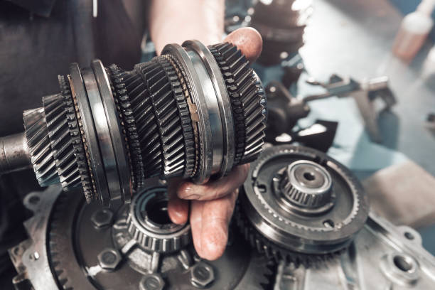 Cross-section of a car gearbox. mechanic work in the garage. Cross-section of a car gearbox. mechanic work in the garage.